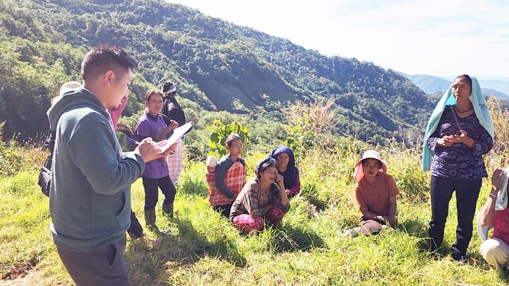 Women farmers interact with Dr Auto Yeputho, District Project Officer, FOCUS-Nagaland, Zunheboto, at Tsukoto peak in Achikuchu village. (Morung Photo)